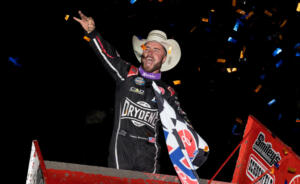 Logan Schuchart celebrates Devil's Bowl win with a wing dance and wearing a cowboy hat