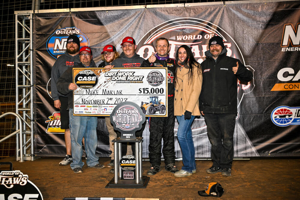 Mike Marlar and the Skyline Motorsports crew celebrating in Victory Lane at The Dirt Track at Charlotte Motor Speedway
