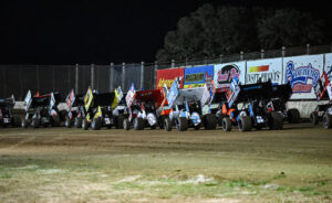 The World of Outlaws NOS Energy Drink Sprint Cars lined up at Cotton Bowl Speedway