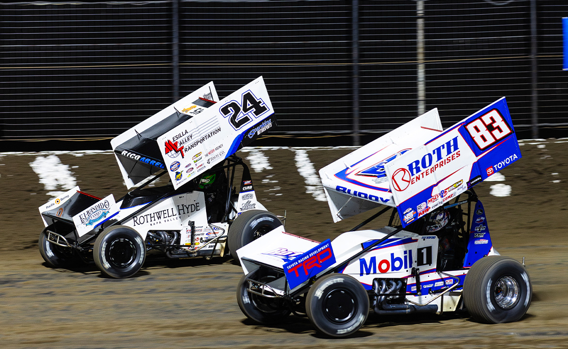 Buddy Kofoid races side by side with Rico Abreu