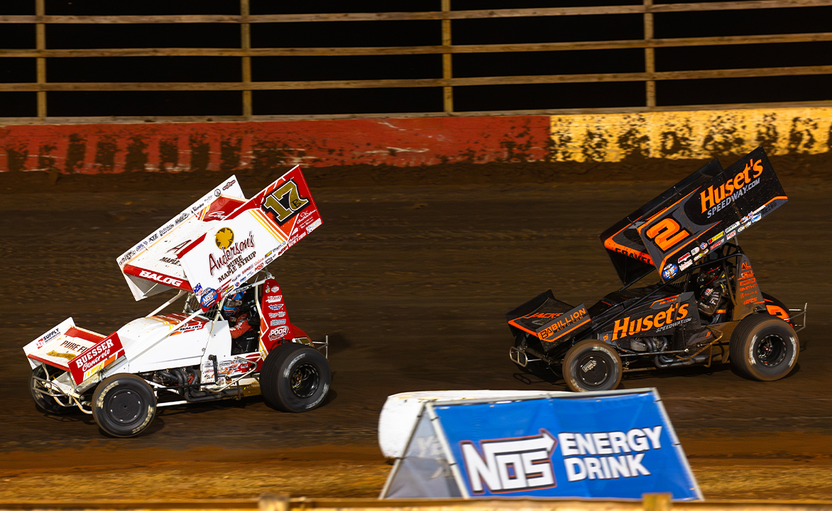 Bill Balog racing ahead of David Gravel at Talladega