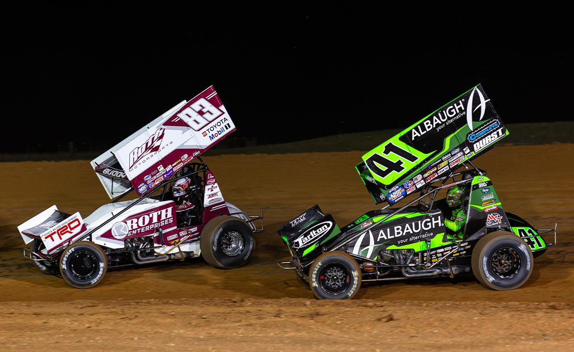Buddy Kofoid racing ahead of Carson Macedo at Lawton