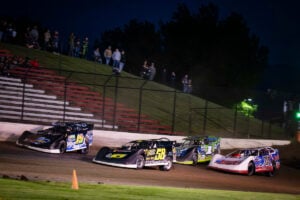 Gustin leading pack of cars
