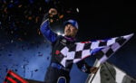 Logan Schuchart celebrating at Jackson Motorplex