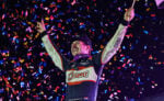 Garet Williamson celebrates at River Cities Speedway