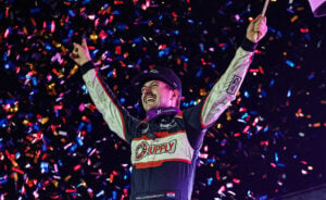 Garet Williamson celebrates at River Cities Speedway
