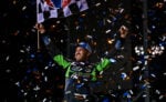 Carson Macedo celebrating at Fix It Forward Speedway