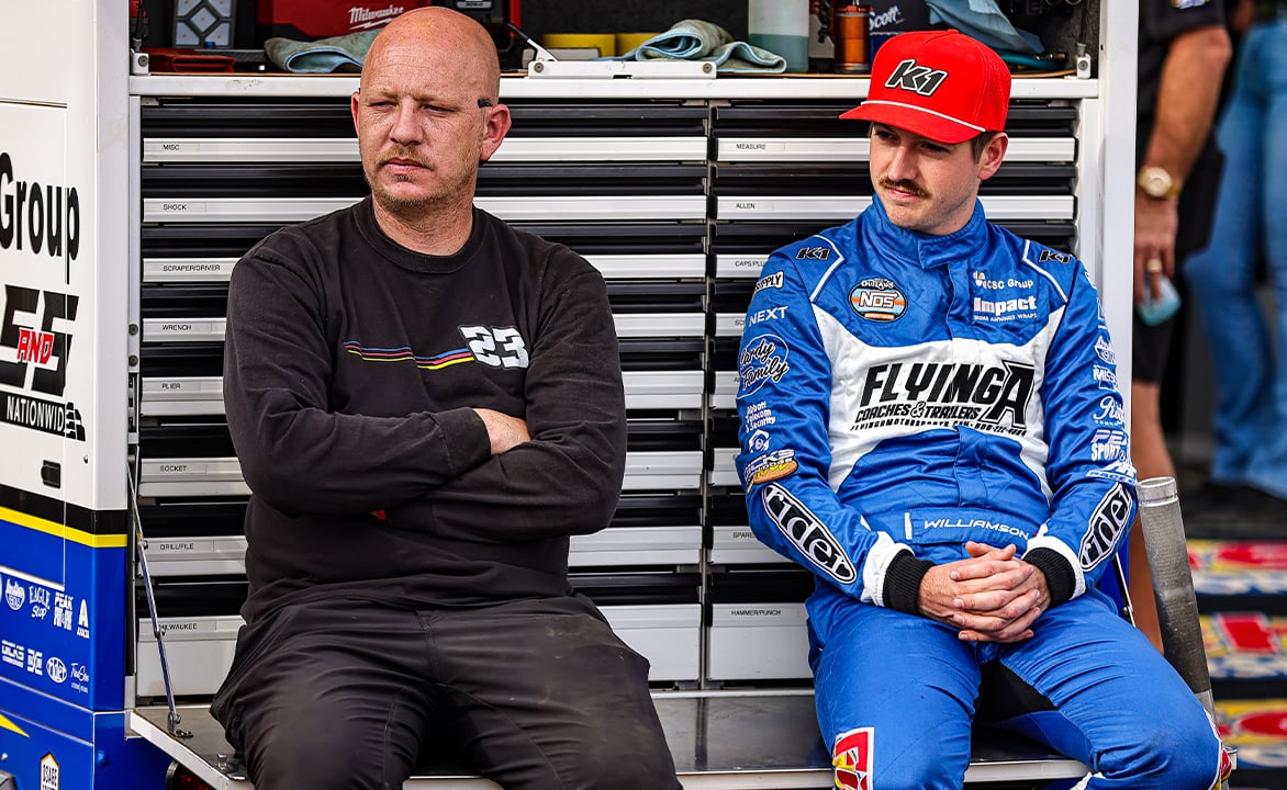 Chad Cypert sits next to Garet Williamson