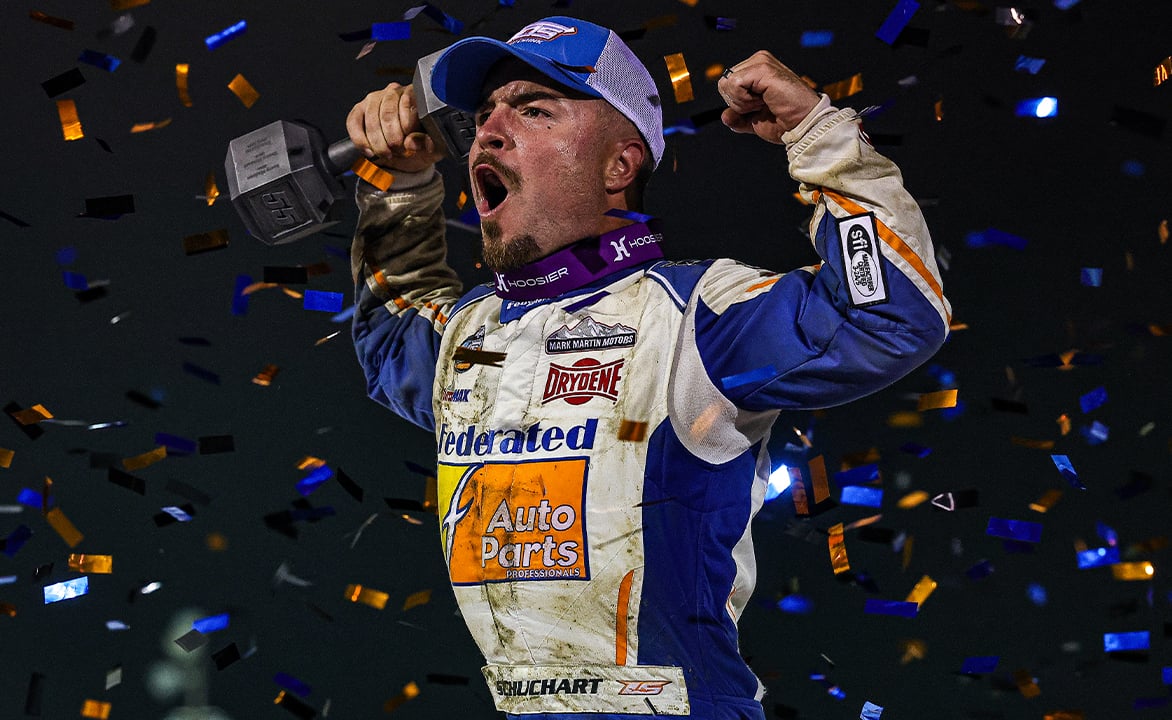 Logan Schuchart celebrating his Ironman 55 win