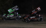 Carson Macedo races ahead of Corey Day at Kings Speedway