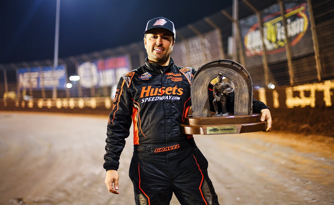 David Gravel holding the 2025 World of Outlaws championship trophy