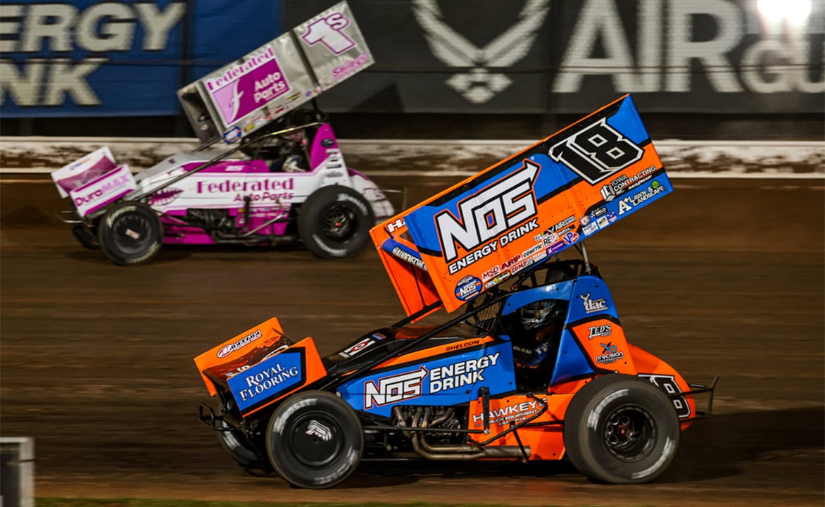 Sheldon Haudenschild races next to Logan Schuchart at Sharon Speedway