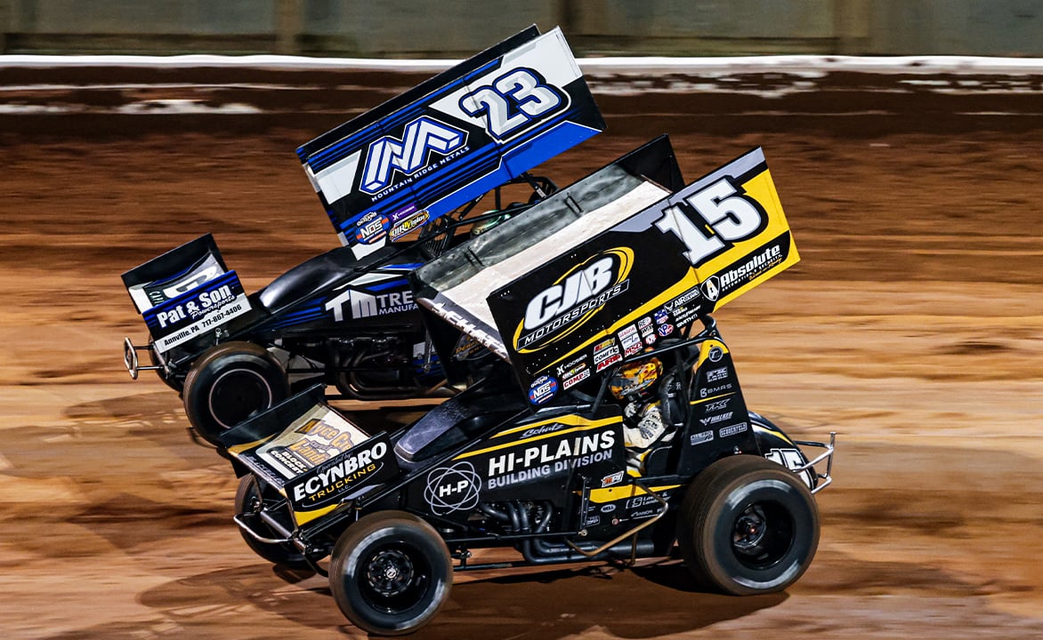 Chase Dietz races next to Donny Schatz at Williams Grove Speedway