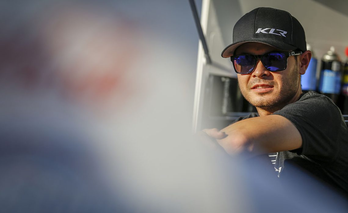 Kyle Larson (1K) hangs out in the pit area before hot laps for the All-Star Circuit of Champions night at Volusia Speedway Park in DeLeon, Florida.