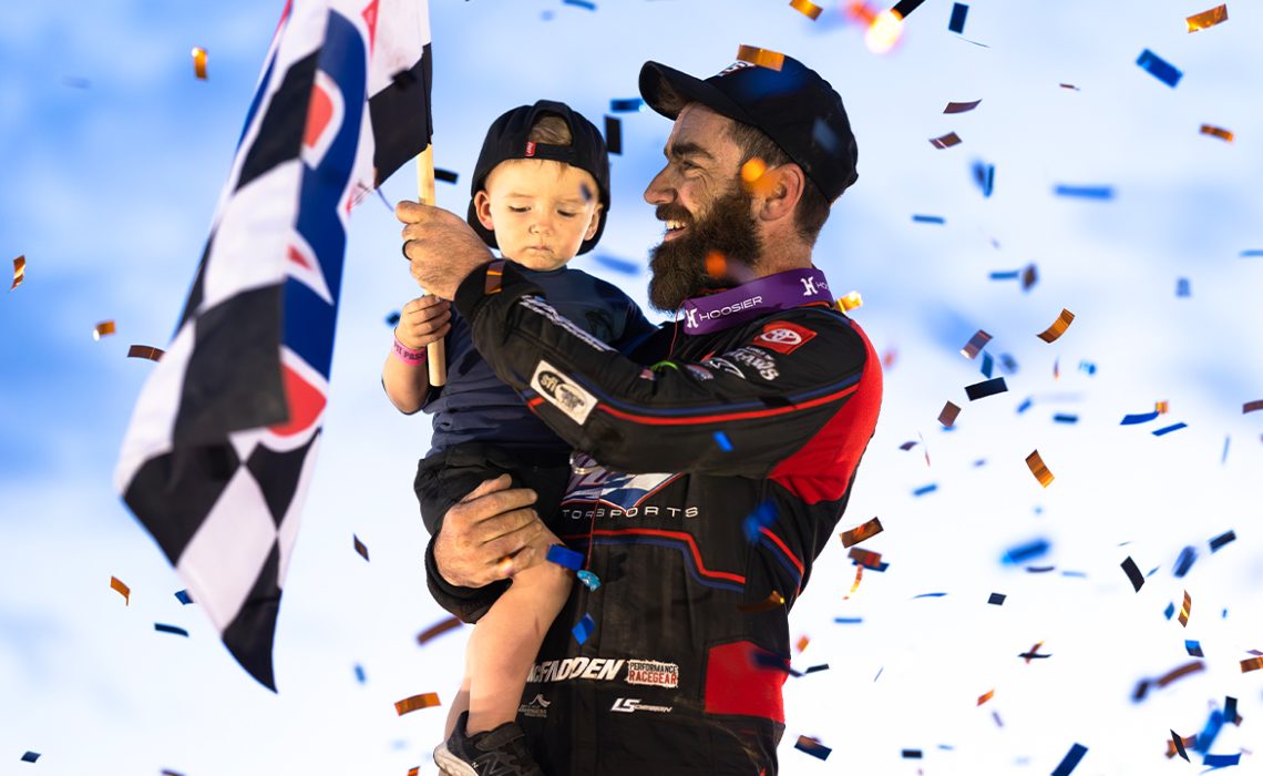 James McFadden celebrating with his son, Mac.