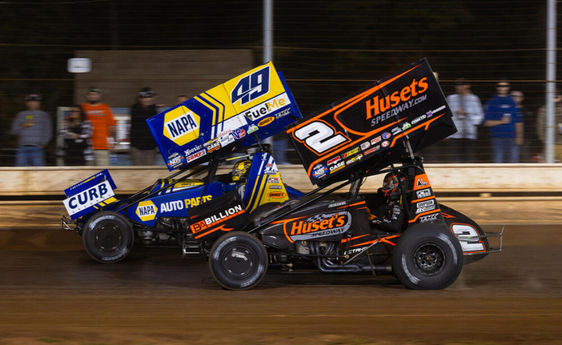 Brad Sweet and David Gravel race side by side at Sharon Speedway.